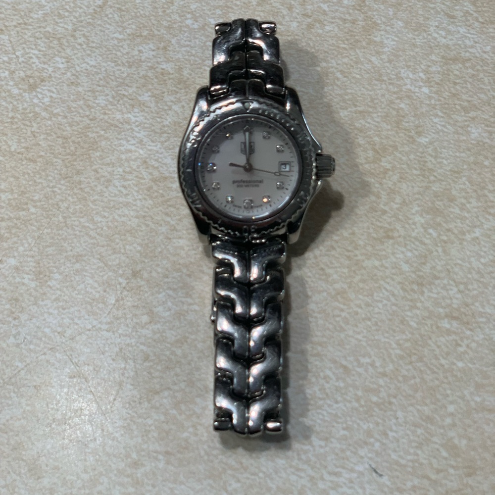 Tag watch silver w diamonds